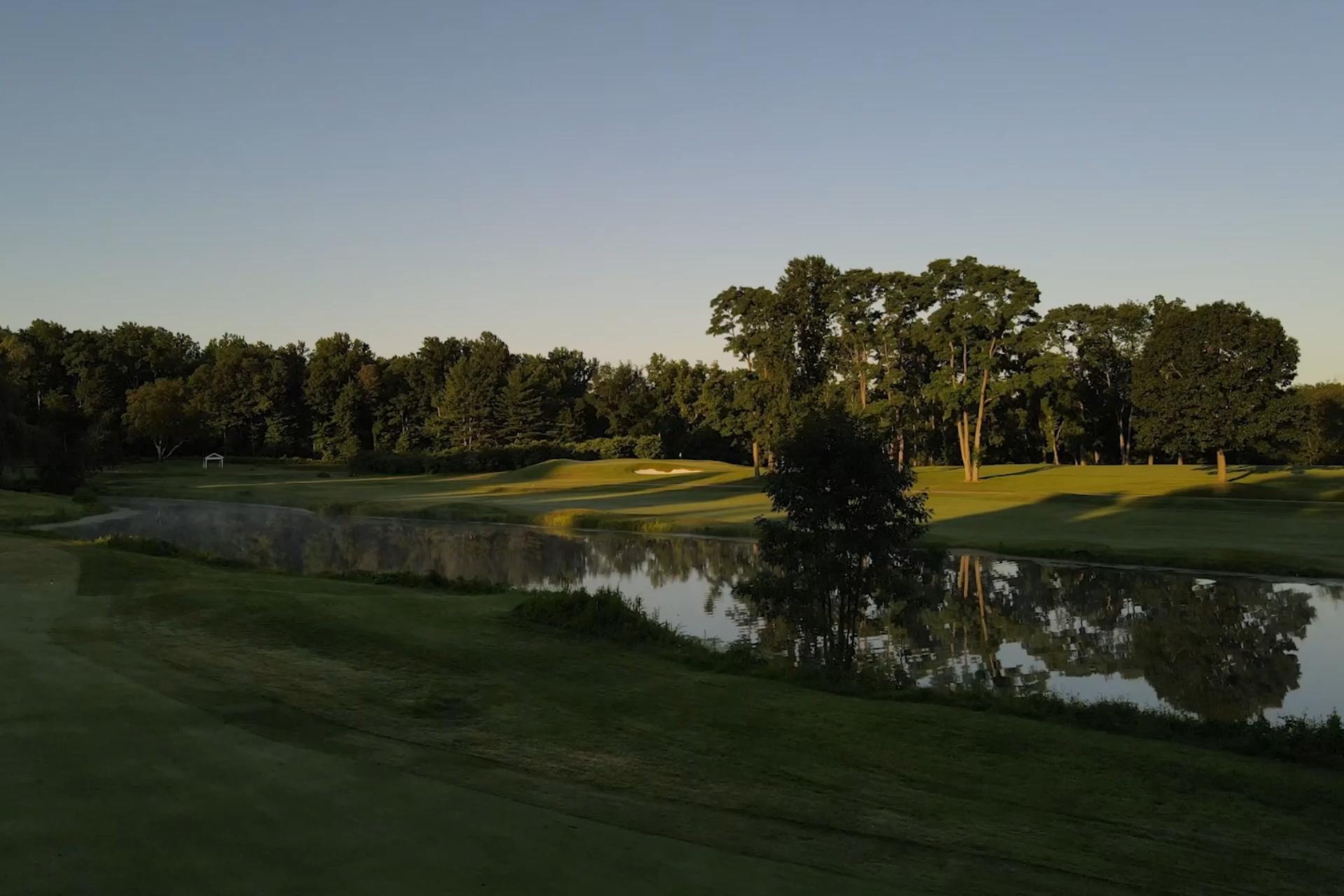 dusk view of country club fairway and hole